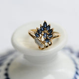 Vintage cocktail ring with marquise sapphires and diamonds