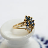 Vintage cocktail ring with marquise sapphires and diamonds