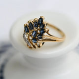 Vintage cocktail ring with marquise sapphires and diamonds