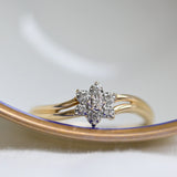 Vintage rosette ring composed by diamonds