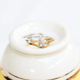 Flower diamond ring in 18K yellow gold with brilliant cut diamonds.