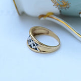 Vintage ring with interlaced zigzag sapphires
